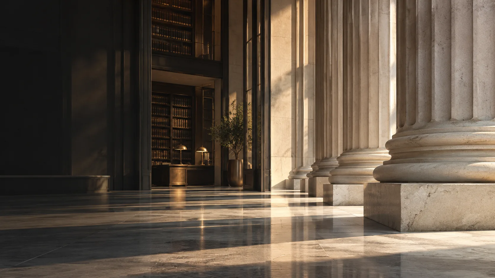 Contemporary stone columns beside a quiet legal library